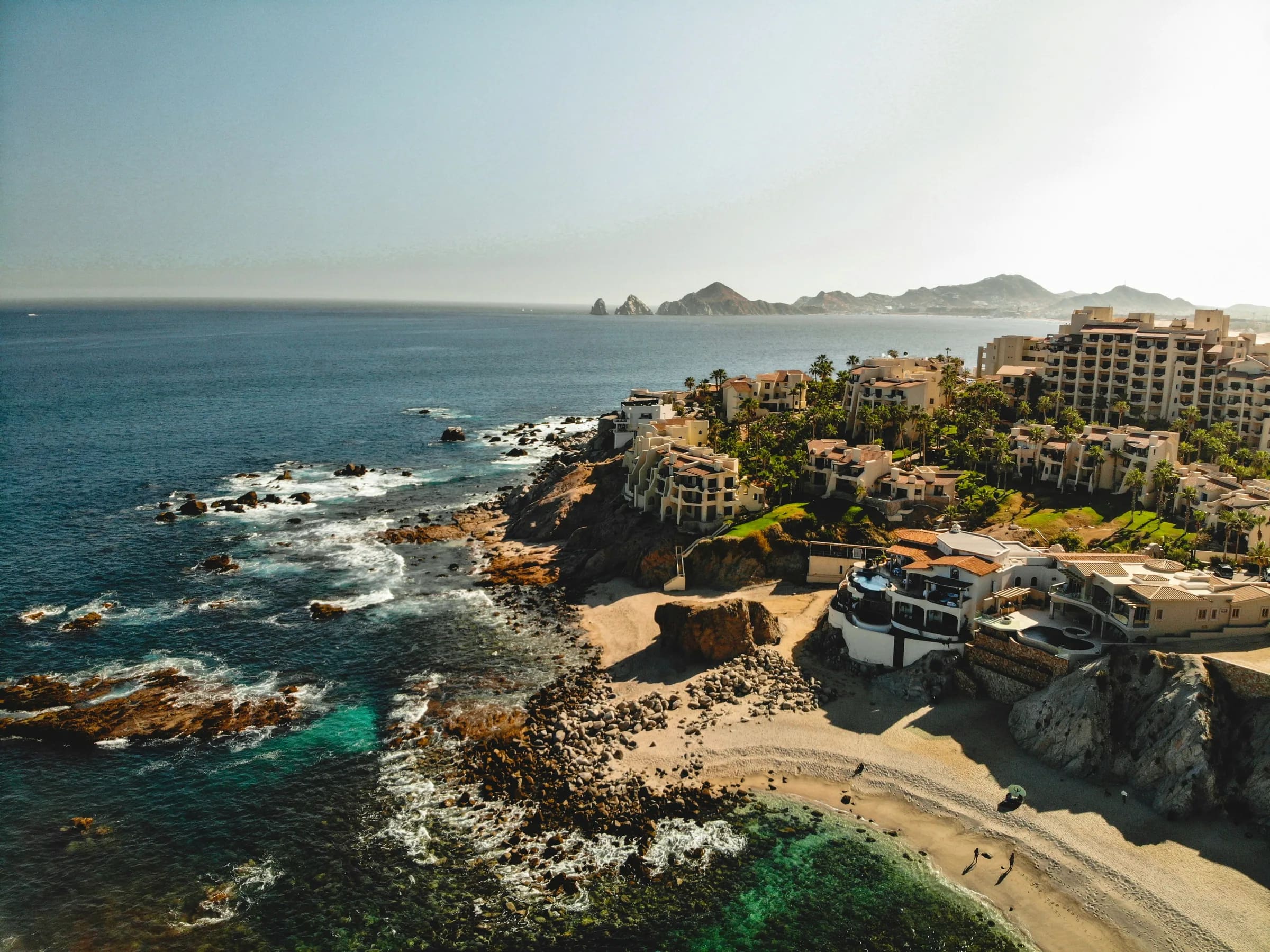 Cabo San Lucas coastline with Land's End and oceanfront residences